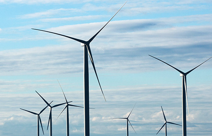 wind energy turbines in field